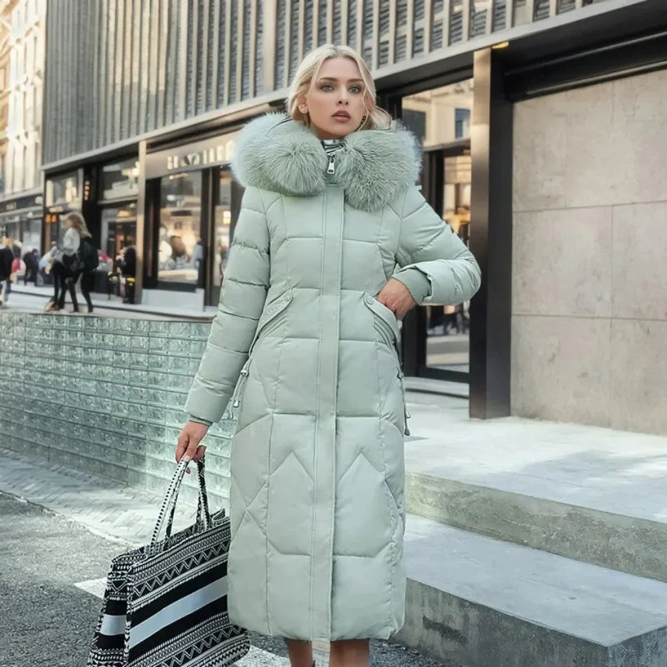 Padded long coat - stylish ladies winter jacket with faux fur collar