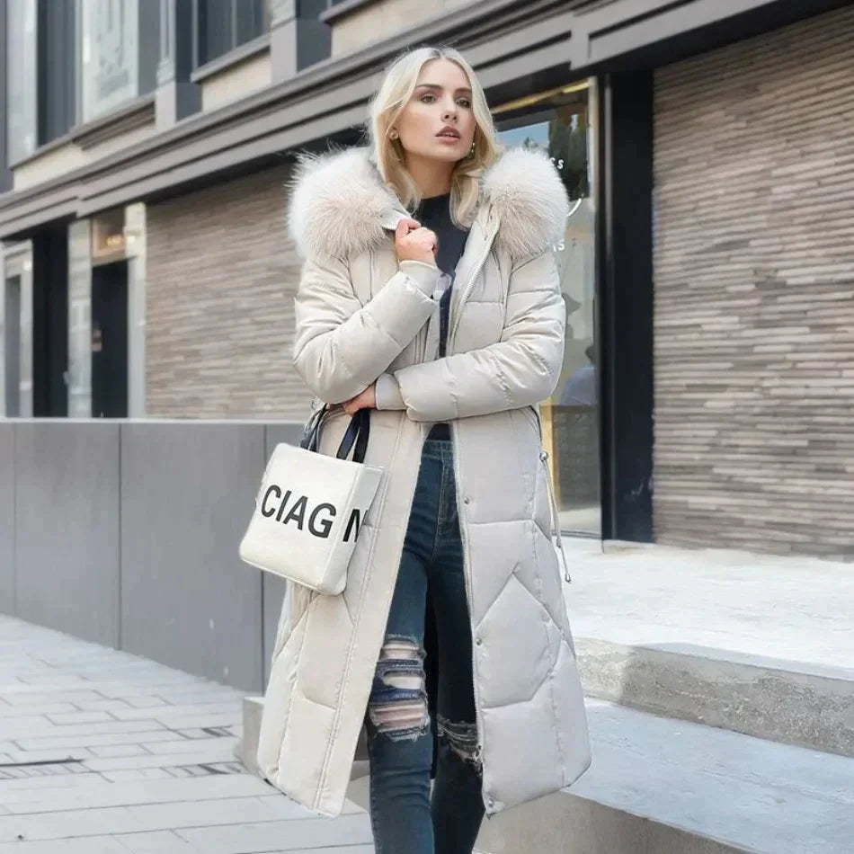 Padded long coat - stylish ladies winter jacket with faux fur collar
