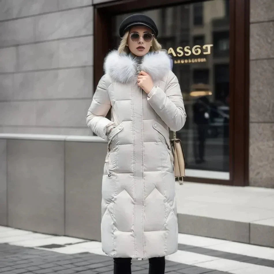 Padded long coat - stylish ladies winter jacket with faux fur collar