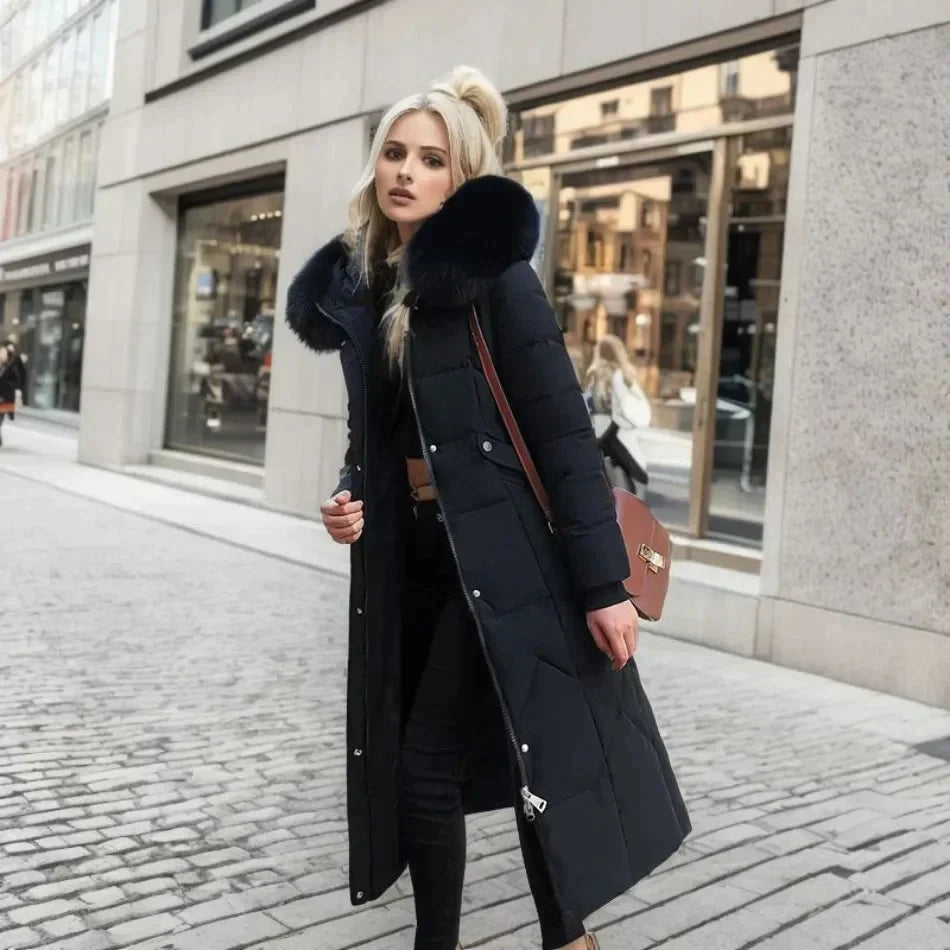 Padded long coat - stylish ladies winter jacket with faux fur collar