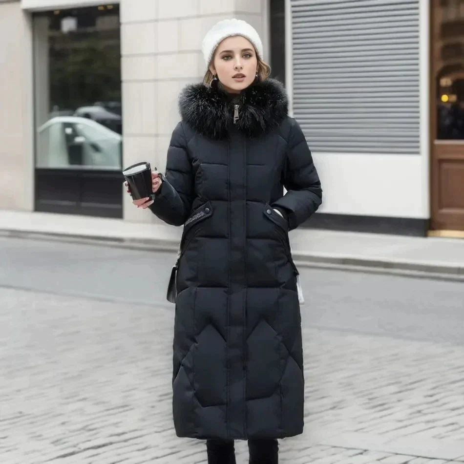 Padded long coat - stylish ladies winter jacket with faux fur collar