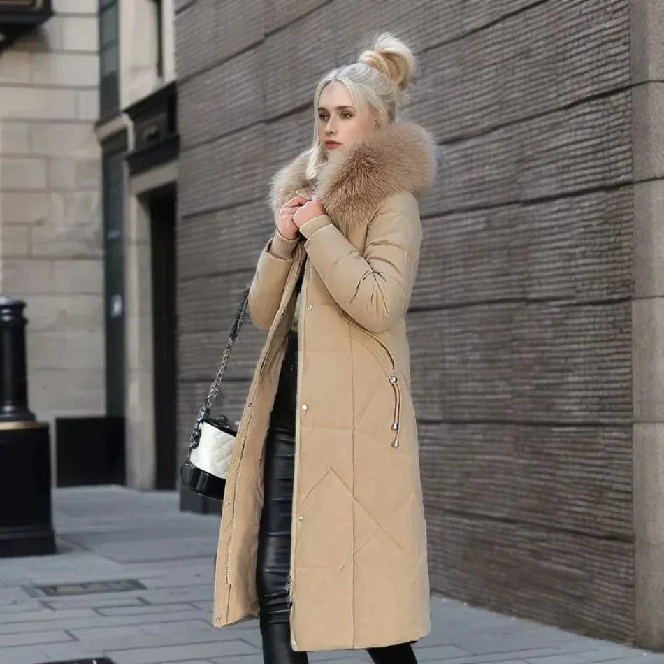 Padded long coat - stylish ladies winter jacket with faux fur collar
