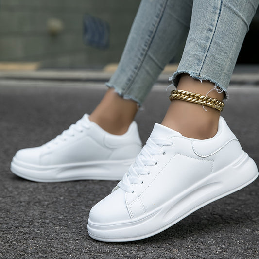 Ladies' leather sneakers - stylish white low-top trainers